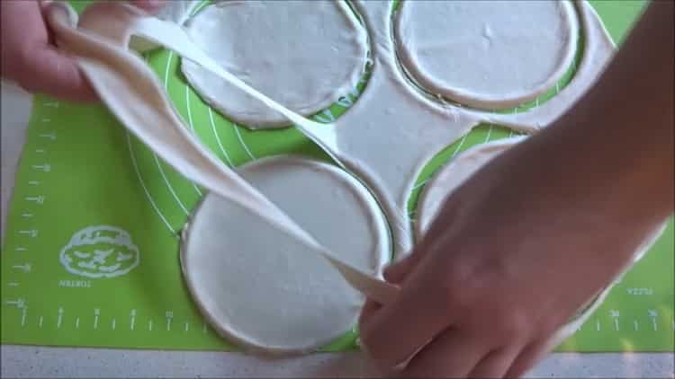 Roll dough to make dumplings