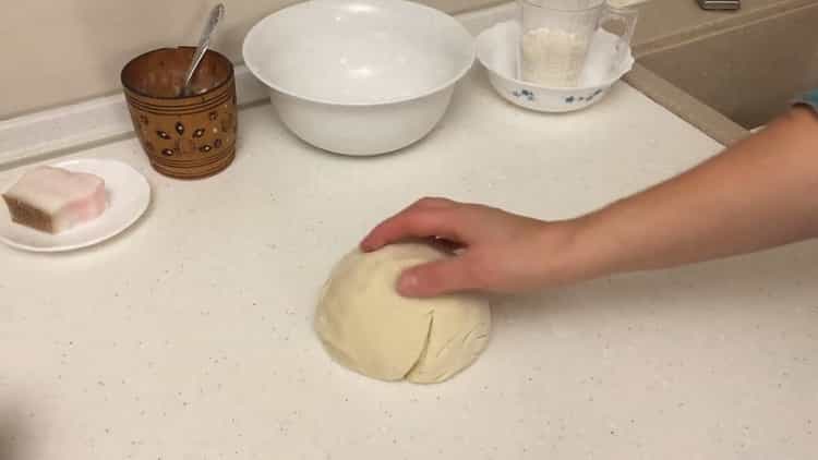 To make dumplings with potatoes and bacon, knead the dough