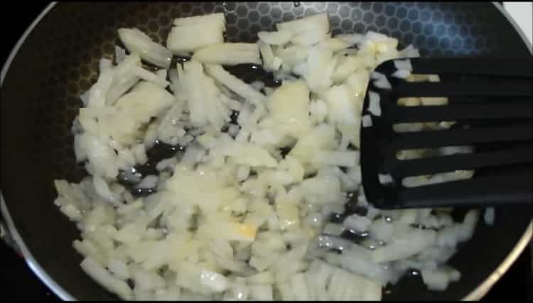 pink salmon in the oven with onions and carrots chop onions