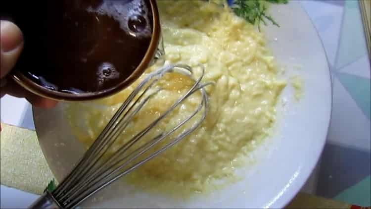 To cook pink salmon in batter in a pan, add flour