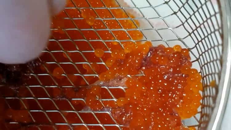 Before salting the trout caviar, grind the caviar