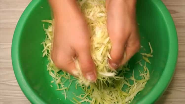 To make a cabbage casserole, cut the cabbage