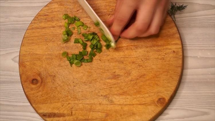 To prepare a cabbage casserole, chop onions