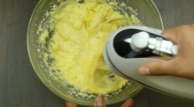 Prepare the ingredients to make a cupcake with apples.