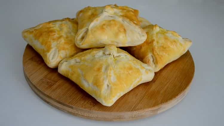 envelopes from puff pastry with filling are ready