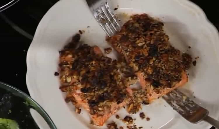 Oven baked red fish with walnuts