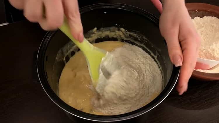 To make a cake in a slow cooker, knead the dough