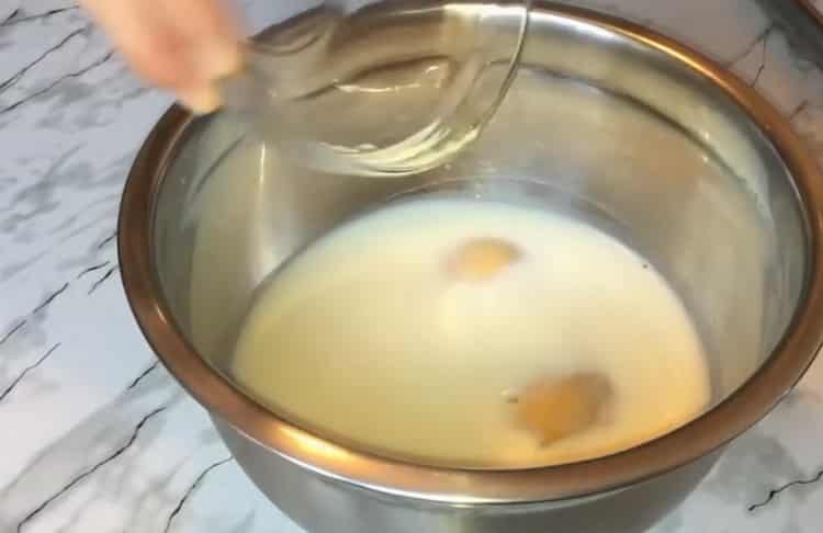 Cooking lazy khachapuri with cheese in a pan