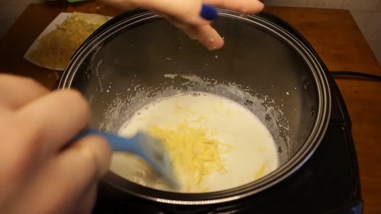 Grate cheese to cook