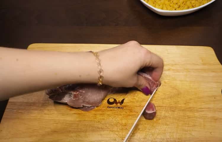 To prepare pasta with meat, prepare the ingredients