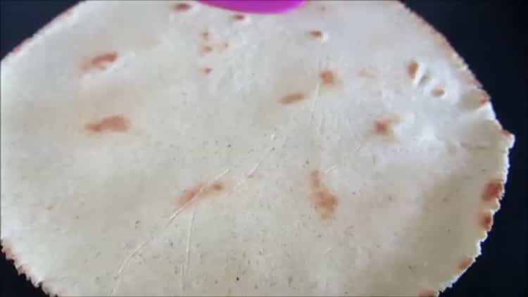 To cook Mexican tortillas, preheat the pan