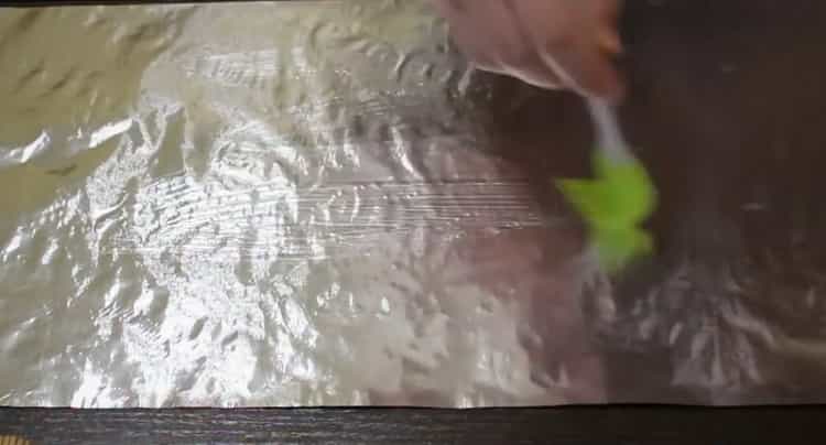 To cook marine in the oven, grease the foil with oil