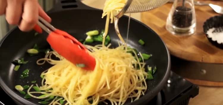 To make salmon pasta, add the pasta to the pan