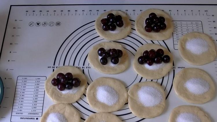To make cherry pies, put the filling on the dough