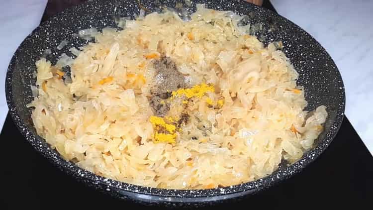To make sauerkraut pies, saute the cabbage