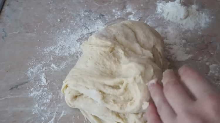 To make pies with onions and eggs, knead the dough