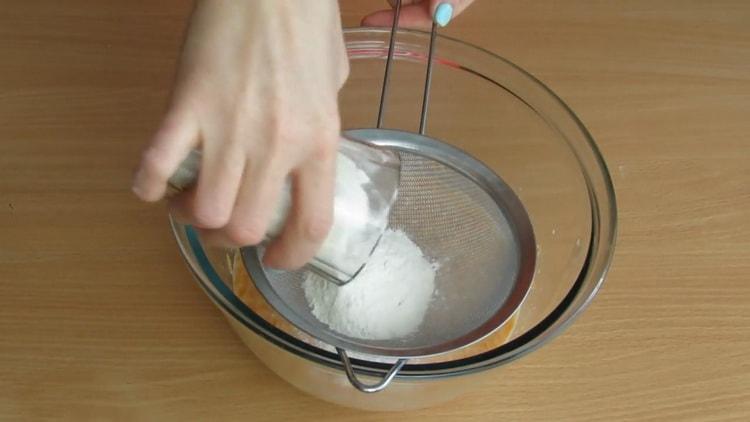 Sift flour to make carrot pies