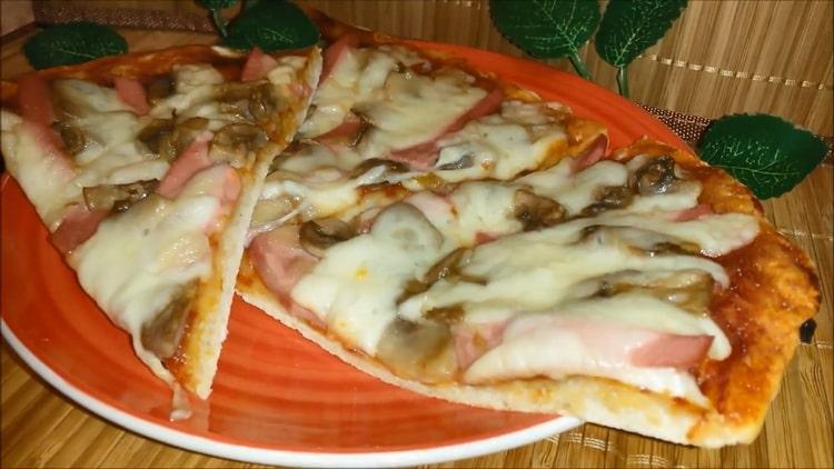 Pizza with mushrooms and sausage: a step by step recipe with photos