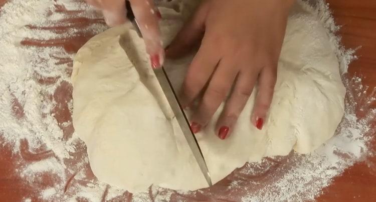 To make wheat bread, cut the dough
