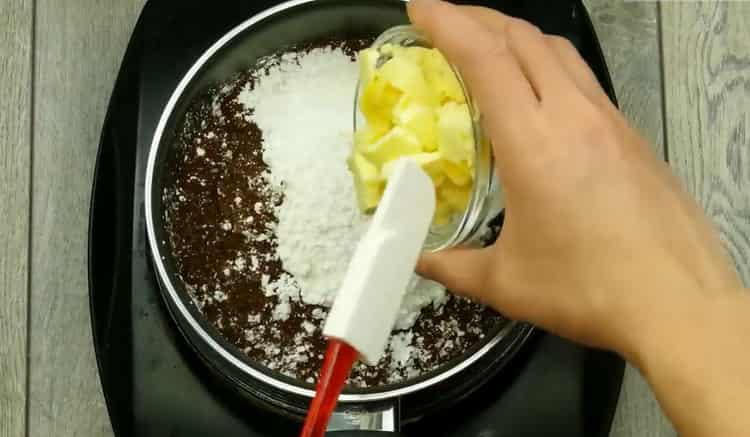 Para hacer un muffin de chocolate en el horno, de acuerdo con la receta, prepare la mantequilla