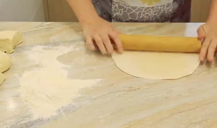 Roll out the dough to make samsa