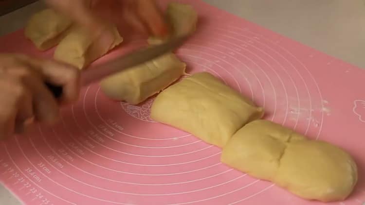To make buns, cut the dough