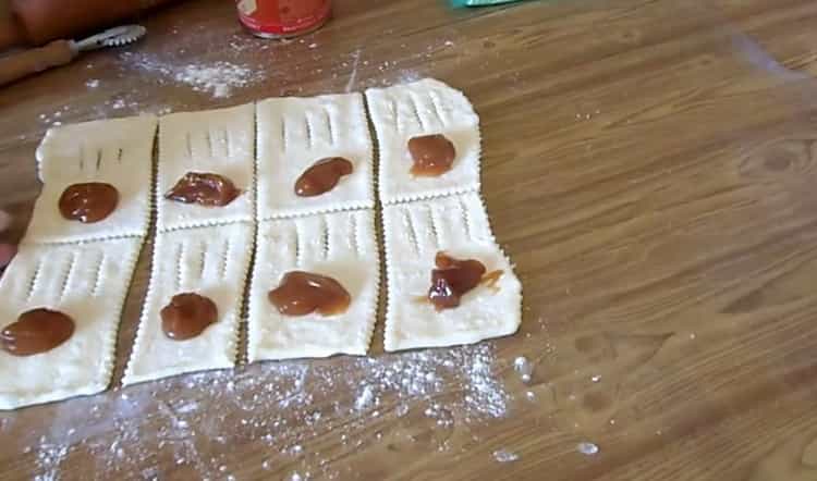 To make puff pastry puffs, cut the dough