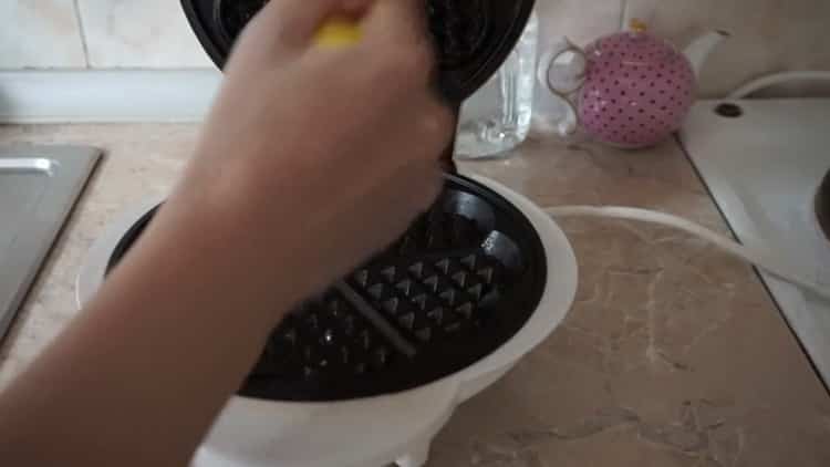 To make waffles, grease the waffle iron