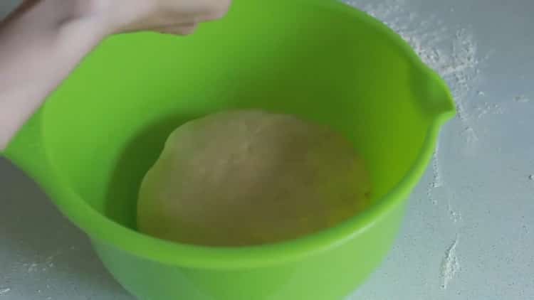 To make dough for buns with dry yeast, place the dough