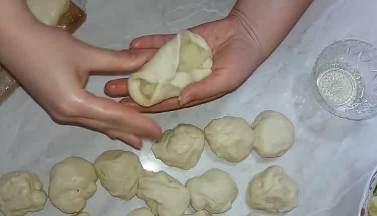 To prepare the dough for pies, half-fill the dough