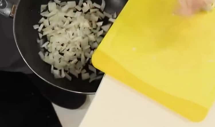 To make tomato spaghetti sauce, chop the onion