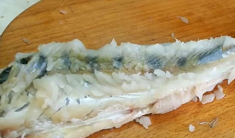 To cook stuffed zander, take the meat