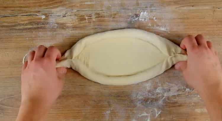 За да направите лодка khachapuri, дайте формата