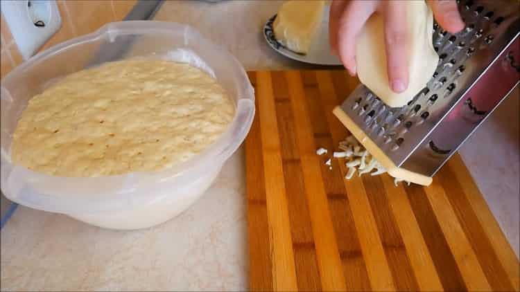 To make khachapuri in Georgian grate cheese