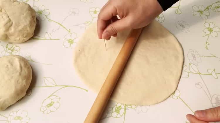 To make khachapuri, prepare a rolling pin