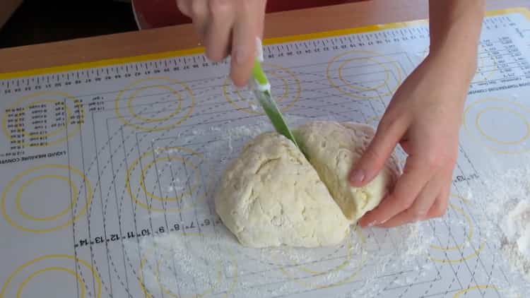 To make khachapuri with cottage cheese and cheese, divide the dough