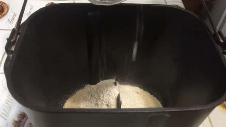 preparar pan integral en una máquina de pan