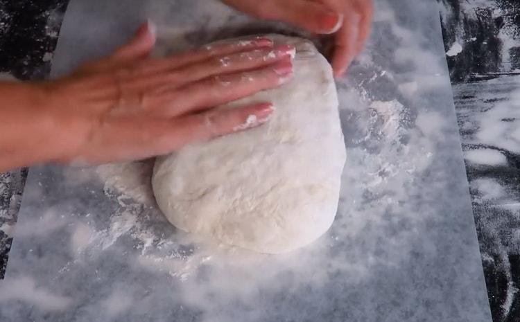 Roll dough to make ciabatta bread