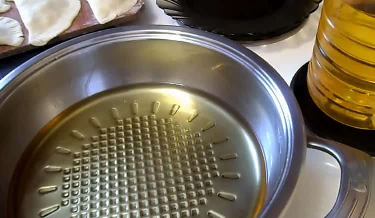 To make chebureks with cheese, heat oil
