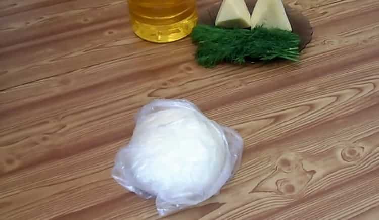 To make chebureks with cheese, wrap the dough in a bag