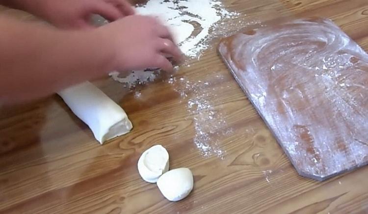 To make chebureks with cheese, prepare the dough