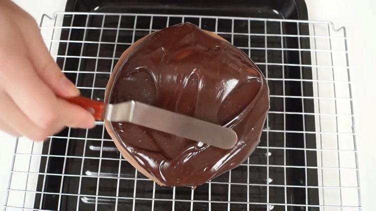 To make a chocolate banana cake, grease the cake