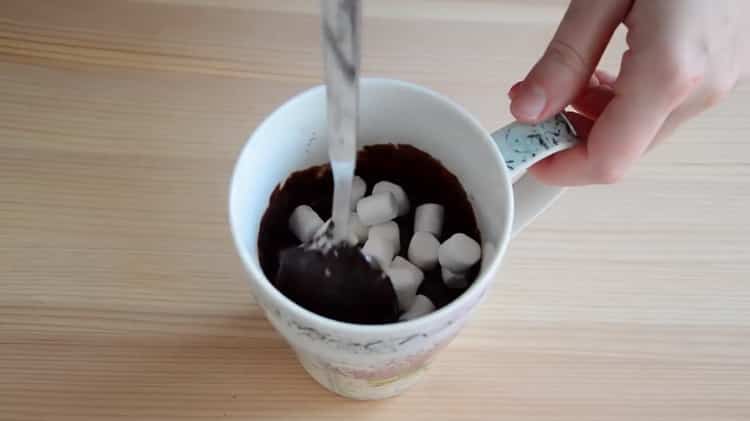 Add marshmallows to make chocolate muffin in the microwave