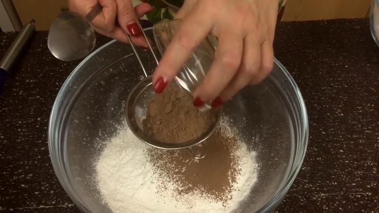 Ajoutez du cacao pour faire un muffin au chocolat avec des cerises