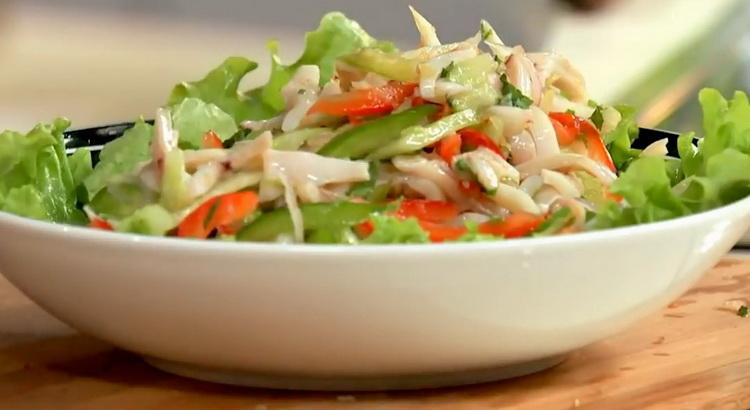 salad with squid and fresh cucumber is ready
