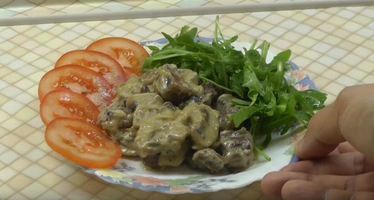 Appetizing beef stroganoff with mushrooms is ready.