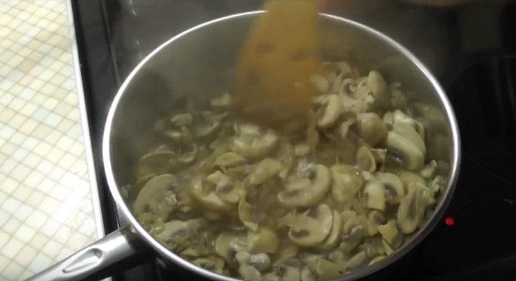 Stew mushrooms, stirring occasionally.