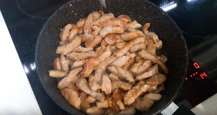 Fry the meat until crusty, then salt and pepper.