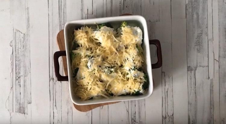 After 10 minutes, sprinkle the dish with grated cheese and return to the oven.
