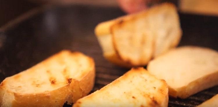 lightly fry the baguette in a grill pan.